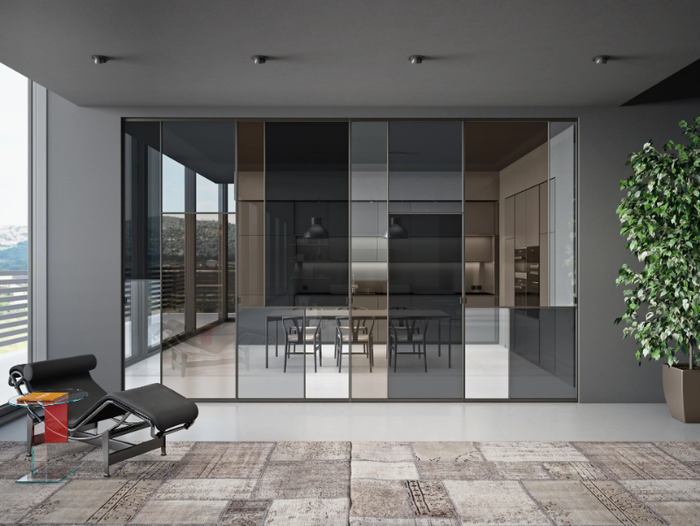 SHERAZADE PATCHWORK SPIN - Pivot glass and aluminium door _ Glas Italia